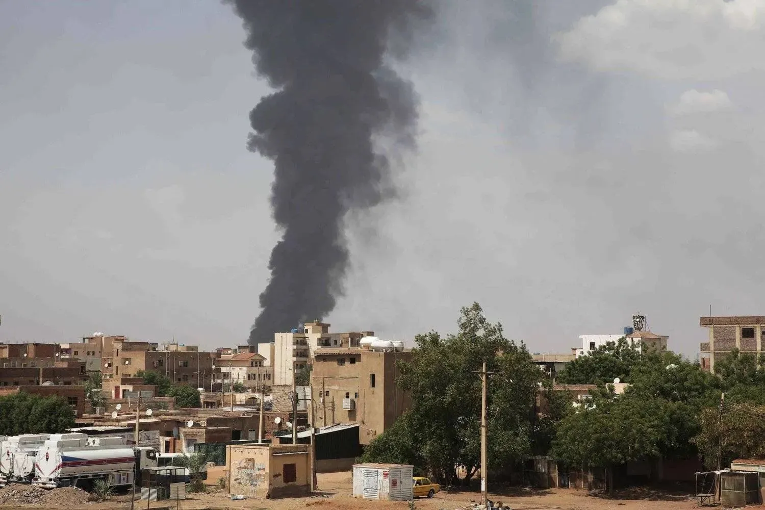 Smoke rises over Khartoum as clashes continue between the Sudanese army and the Rapid Support Forces (AP)