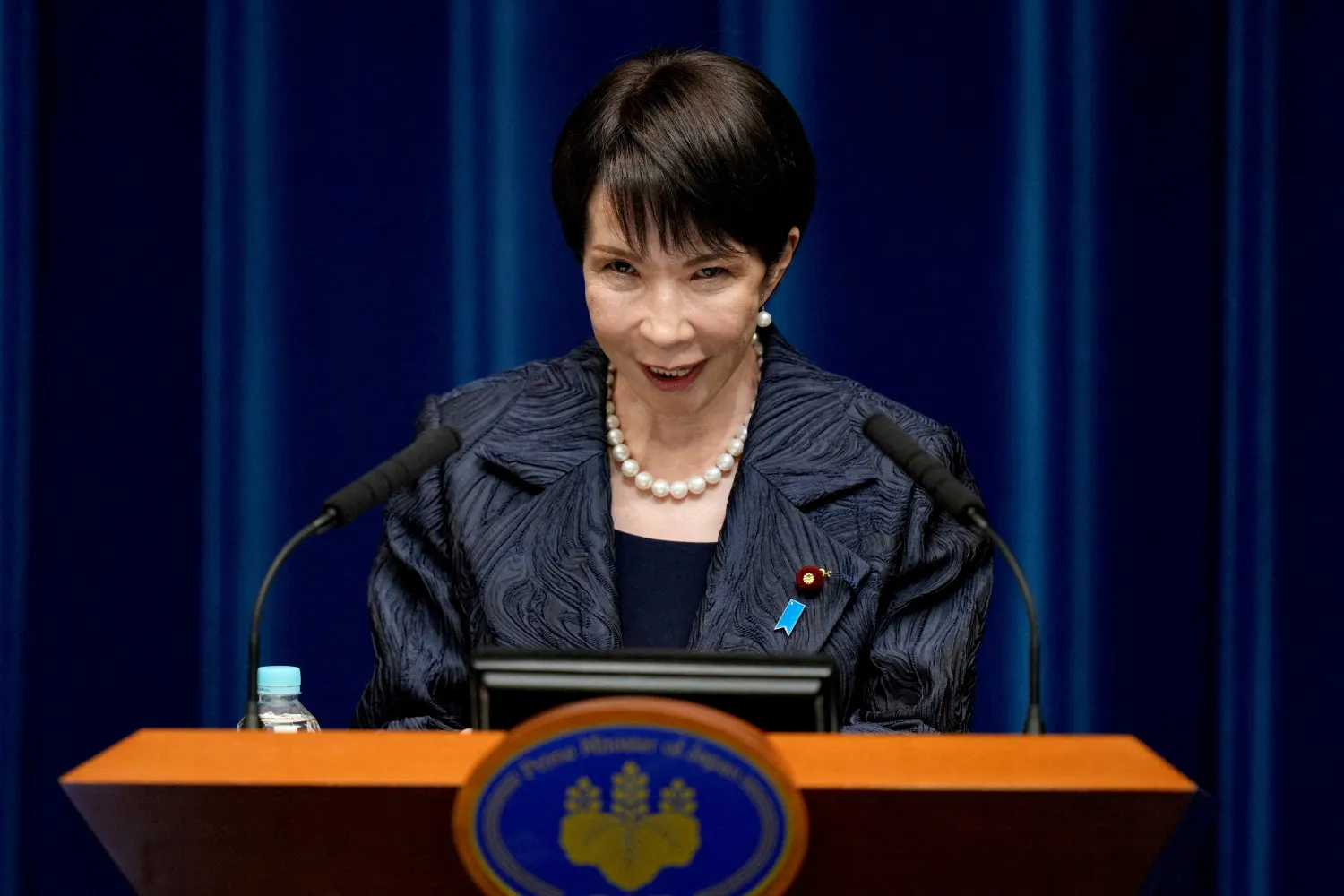 FILE PHOTO:Japan's new Prime Minister Sanae Takaichi speaks during a press conference at the prime minister's office, in Tokyo, Japan, October 21, 2025. Eugene Hoshiko/Pool via REUTERS/File Photo