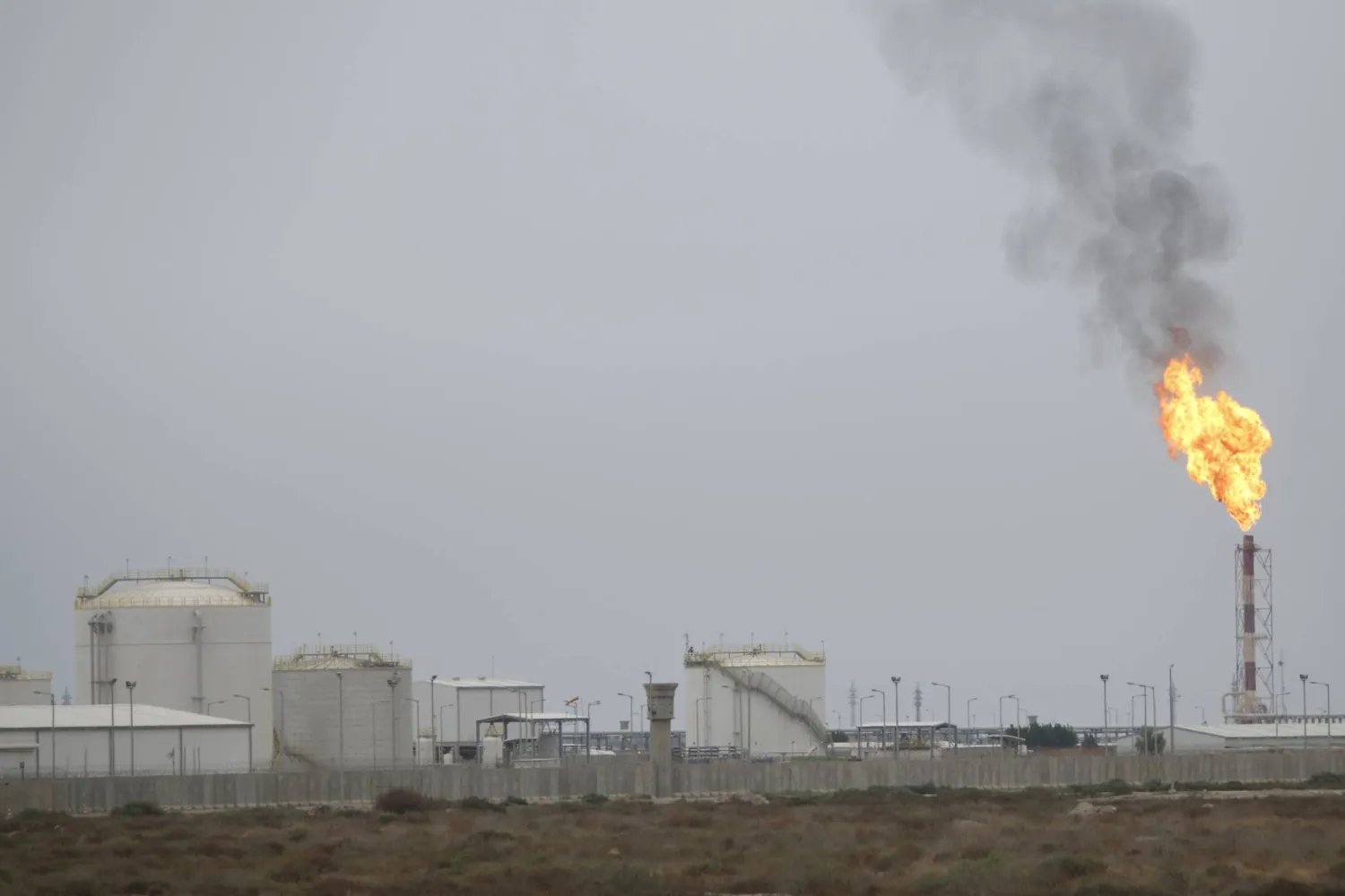 FILE PHOTO: A general view shows the West Qurna-2 oilfield in southern Basra, Iraq, April 17, 2017. REUTERS/Essam Al-Sudani/File Photo