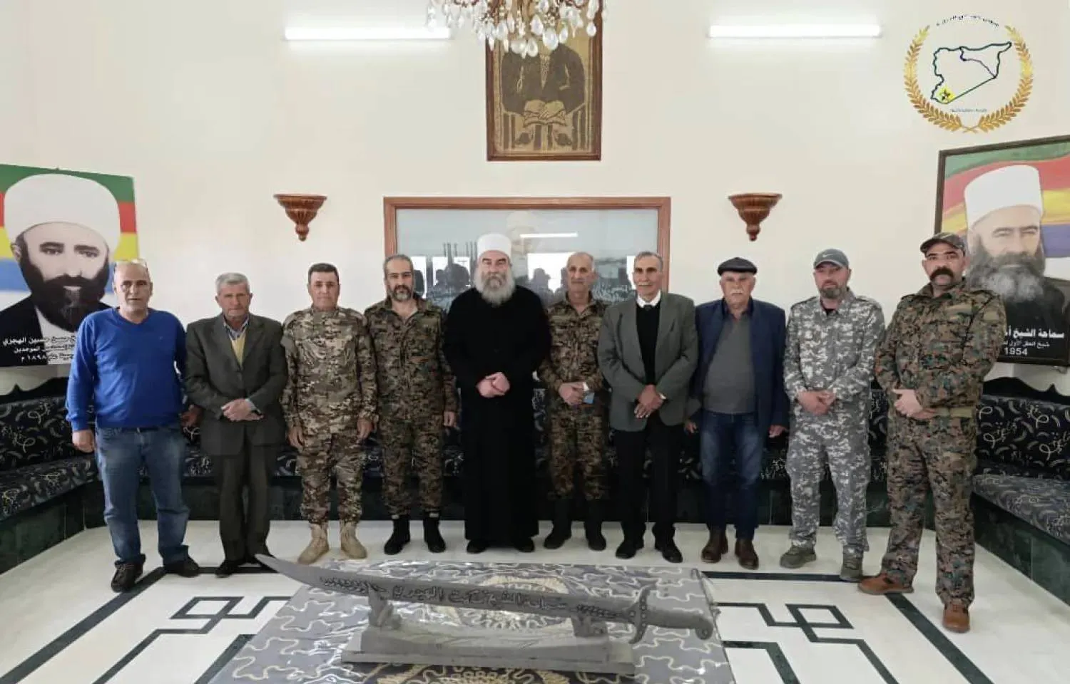 Sheikh Hikmat al-Hijri with members of the “military council” in Sweida. (File photo) 