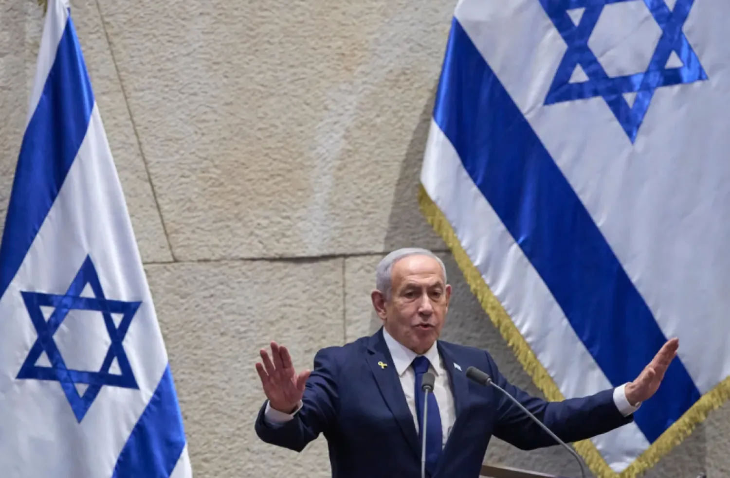 Israel’s Prime Minister Benjamin Netanyahu addresses lawmakers in the Knesset, Israel’s parliament, in Jerusalem, Monday, Nov. 10 2025. (AP Photo/Ohad Zwigenberg)
