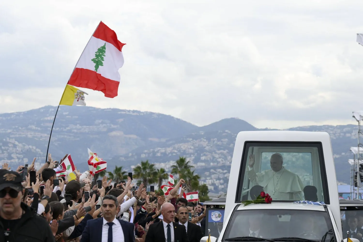 A handout picture provided by the Vatican Media shows Pope Leo XIV greeting the faithful on the day he celebrated a Holy Mass at the Beirut Waterfront, during his apostolic journey, in Beirut, Lebanon, 02 December 2025. EPA/VATICAN 