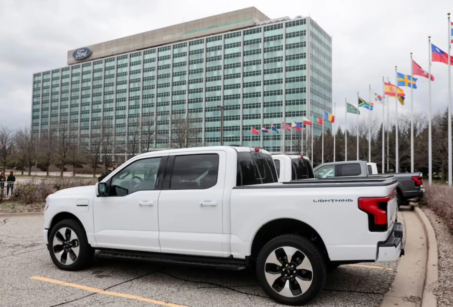 A model of the all-new Ford F-150 Lightning electric pickup is parked in front of the Ford Motor Company World Headquarters in Dearborn, Michigan, US April 26, 2022. REUTERS/Rebecca Cook 