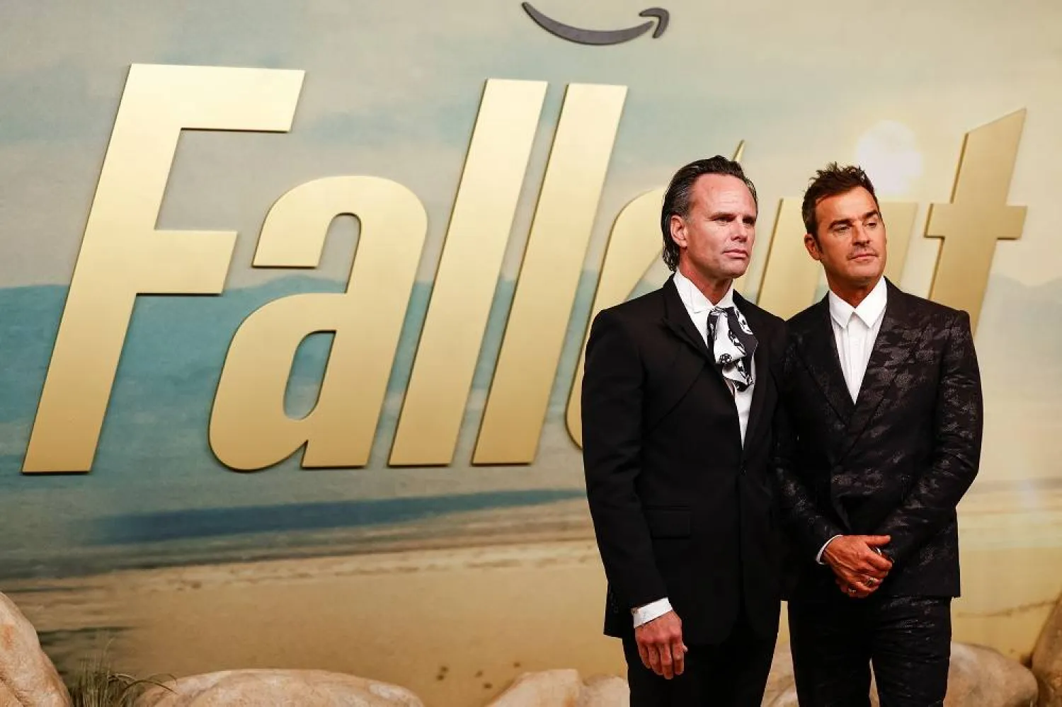 Walton Goggins, left, and Justin Theroux pose for photographers upon arrival at the season two screening of the television series "Fallout" on Tuesday, Dec. 2, 2025, in London. (AP)