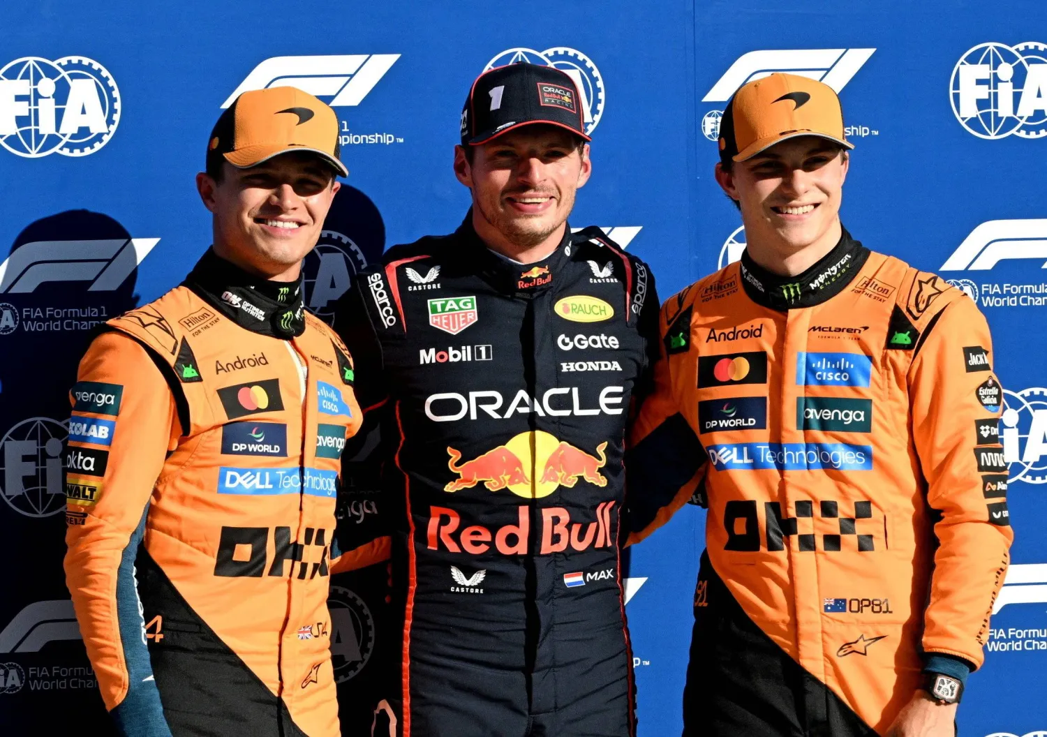 F1 - Italian Grand Prix - Autodromo Nazionale Monza, Monza, Italy - September 6, 2025 Red Bull's Max Verstappen poses after qualifying in pole position with second placed McLaren's Lando Norris and third placed McLaren's Oscar Piastri. (Reuters)