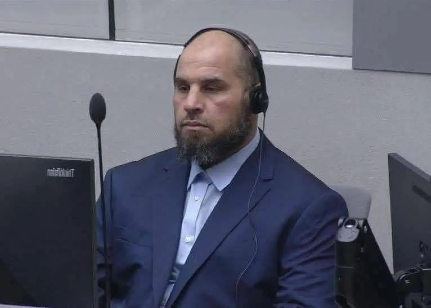 الهيشري القيادي في «جهاز الردع» الليبية خلال مثوله أمام المحكمة الجنائية الدولية الأربعاء (المحكمة)