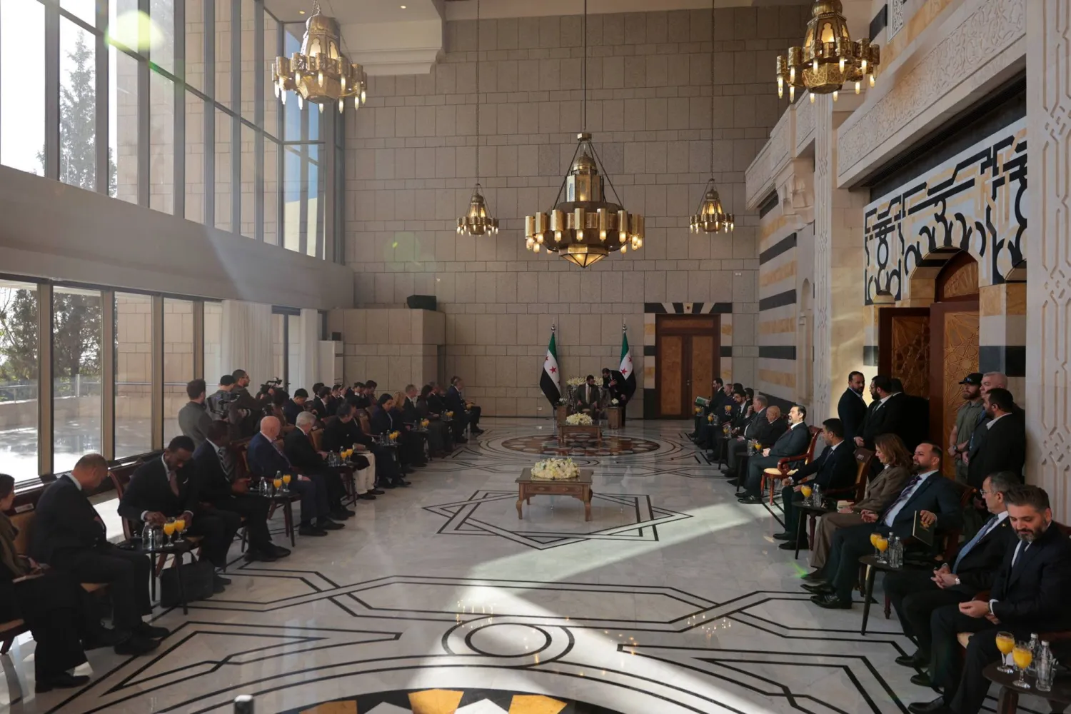 President of Syria's interim government Ahmed Al-Sharaa (C) attends a reception with the UN Security Council delegation at the presidential palace in Damascus, Syria, 04 December 2025. EPA/MOHAMMED AL RIFAI
