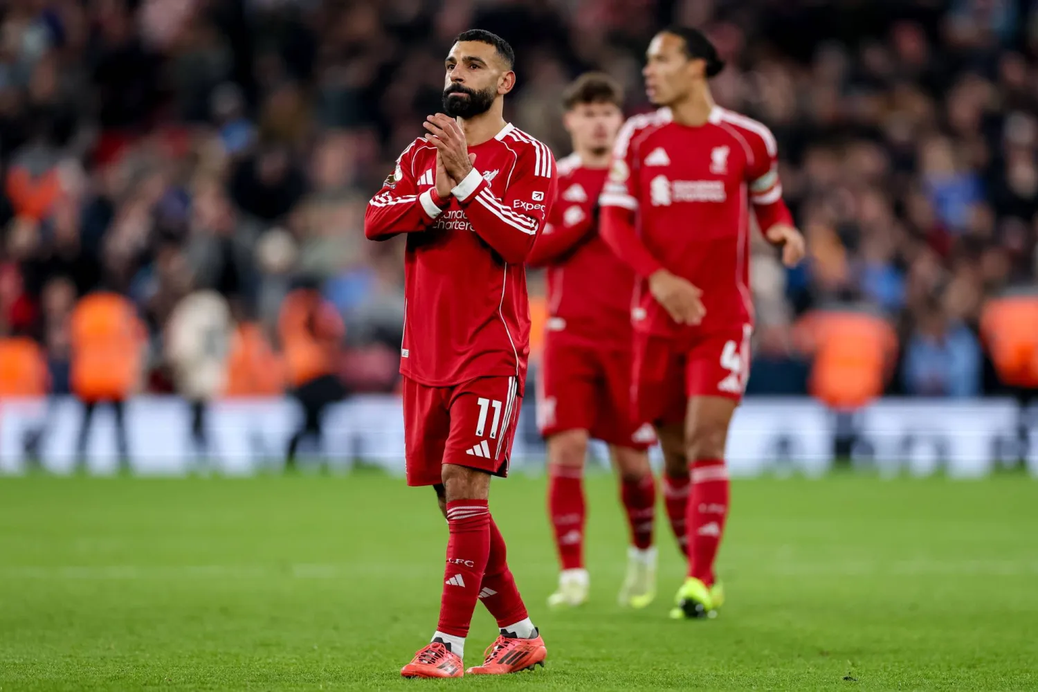Mohamed Salah of Liverpool (L) greets their supporters after the English Premier League match between Liverpool and Sunderland in Liverpool, Great Britain, 03 December 2025.  EPA/ADAM VAUGHAN