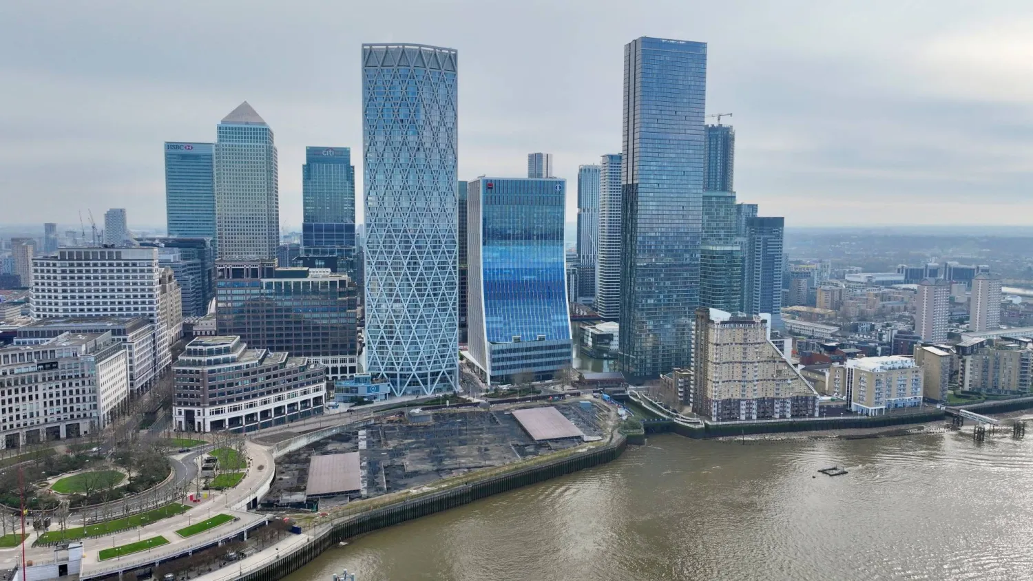 FILE PHOTO: A drone view of London's Canary Wharf financial district, two days before the government presents its critical pre-election budget, in London, Britain March 3, 2024. REUTERS/Yann Tessier/File Photo