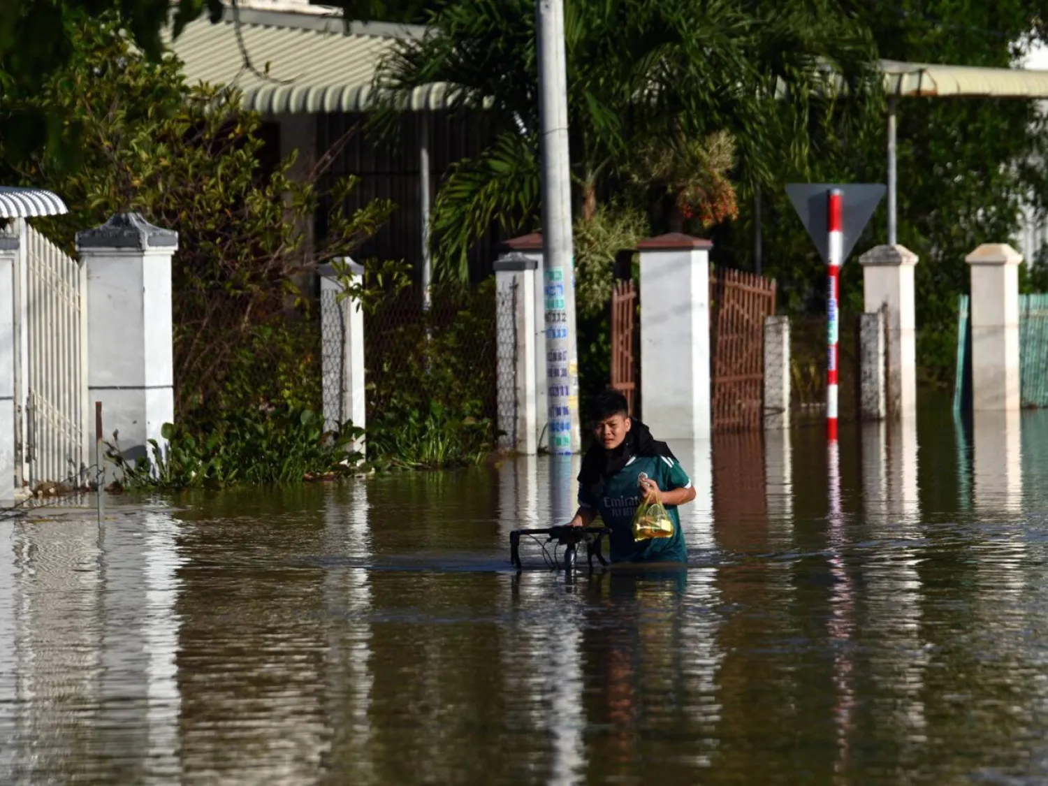 Deadly flooding inundated thousands of homes in Vietnam's Lam Dong province in what authorities say is a record-breaking year of natural disasters. Quoc Nguyen / AFP
