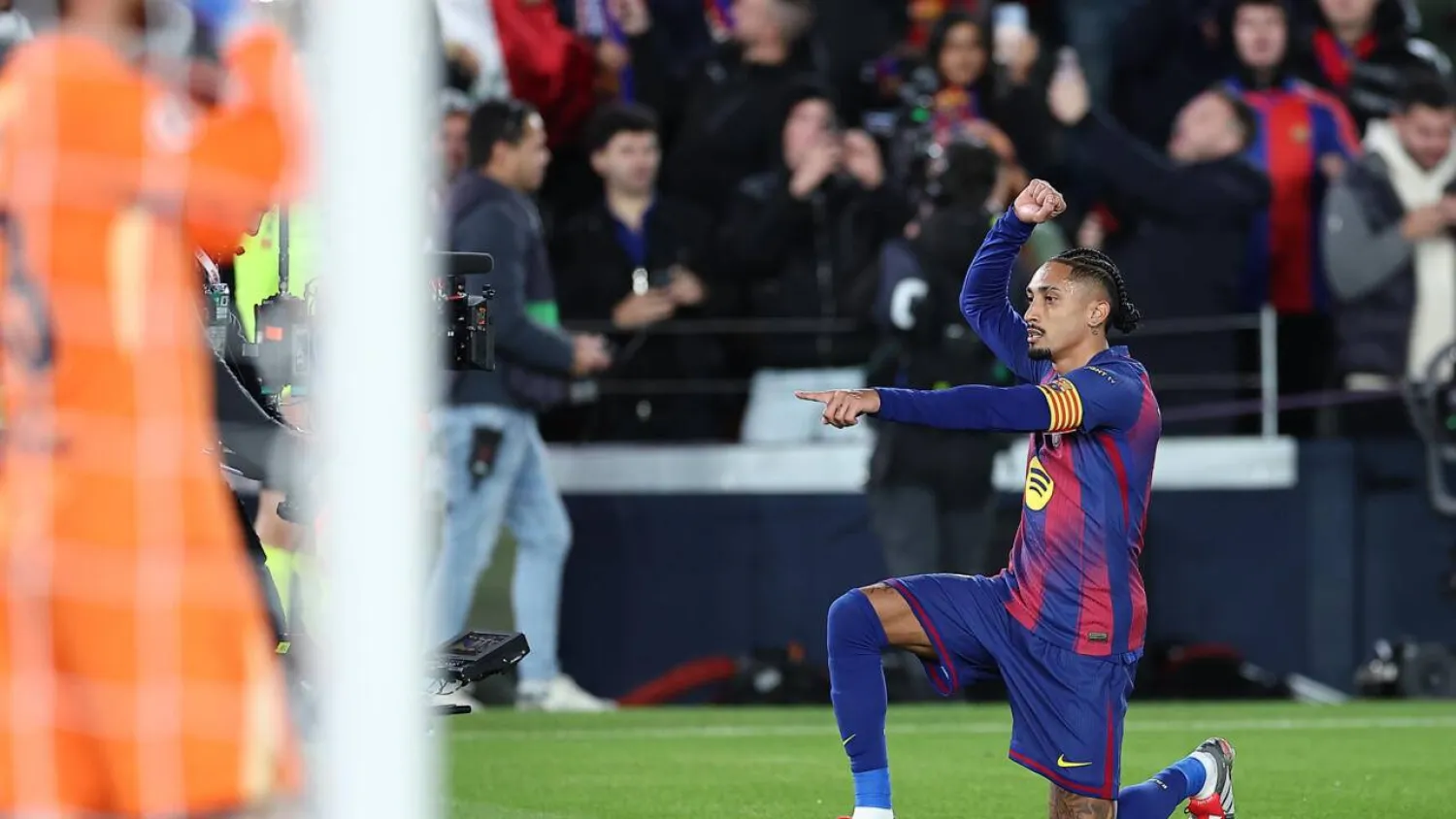 Barcelona's Brazilian forward Raphinha celebrates after scoring against Atletico Madrid. Josep LAGO / AFP
