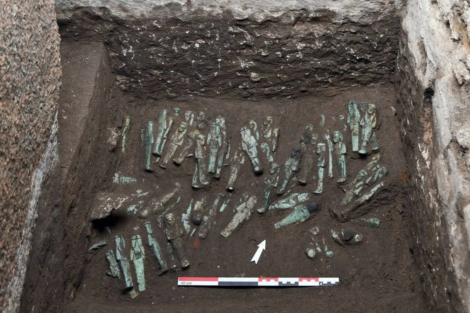 This undated handout photograph released on November 25, 2025 by MFFT-EPHE/PSL shows funerary statuette, knonw as ouchbetis, found in the royal necropolis of Tanis (San el-Hagar). (Simone Nannucci / MFFT - EPHE/PSL / AFP) 