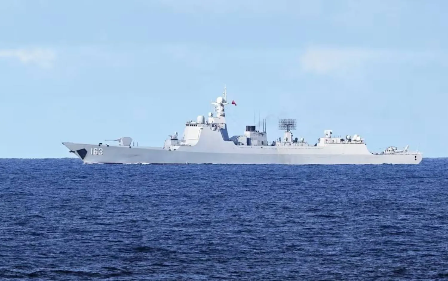 A Chinese PLA navy ship monitors an area during a maritime cooperative activity between the Philippines, Australia and Canadian navy near Scarborough Shoal in the disputed South China Sea on Sep 3, 2025. (AFP) 