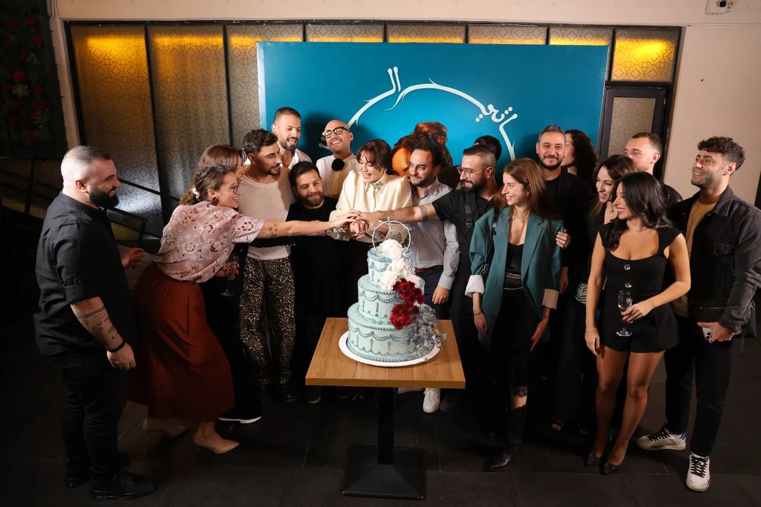 ملّاط خلال احتفالها في إطلاق {حياتي الثالثة} (منال ملاط)