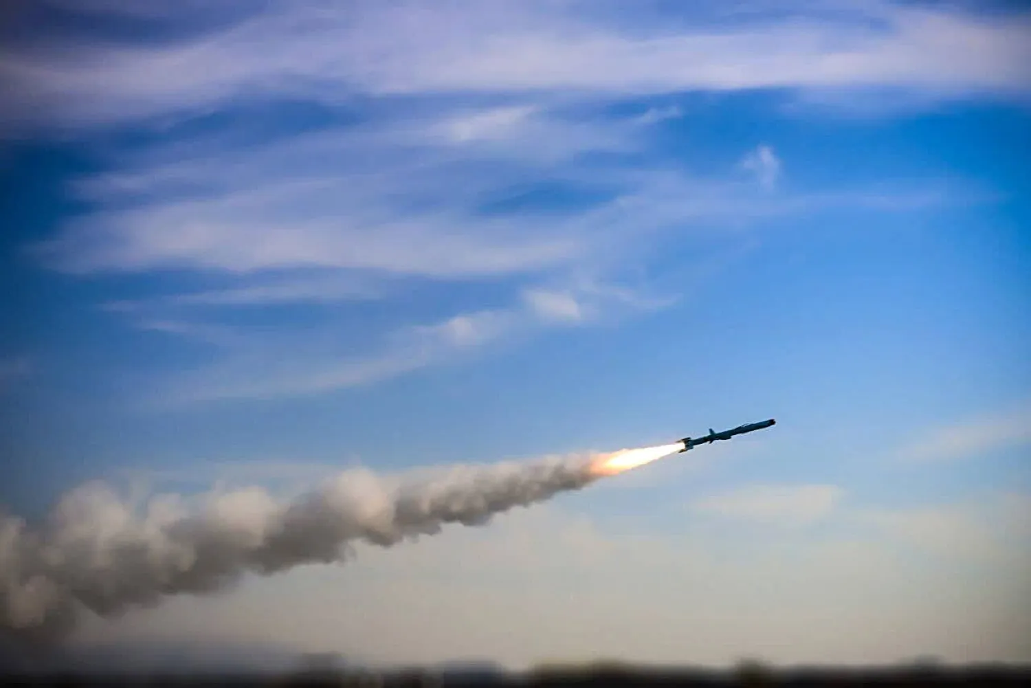 A handout photo made available on 05 December 2025 by the Iranian Revolutionary Guard Corps (IRGC) shows a missile being launched during a military drill in the waters off southern Iran coast. EPA/IRGC HANDOUT  