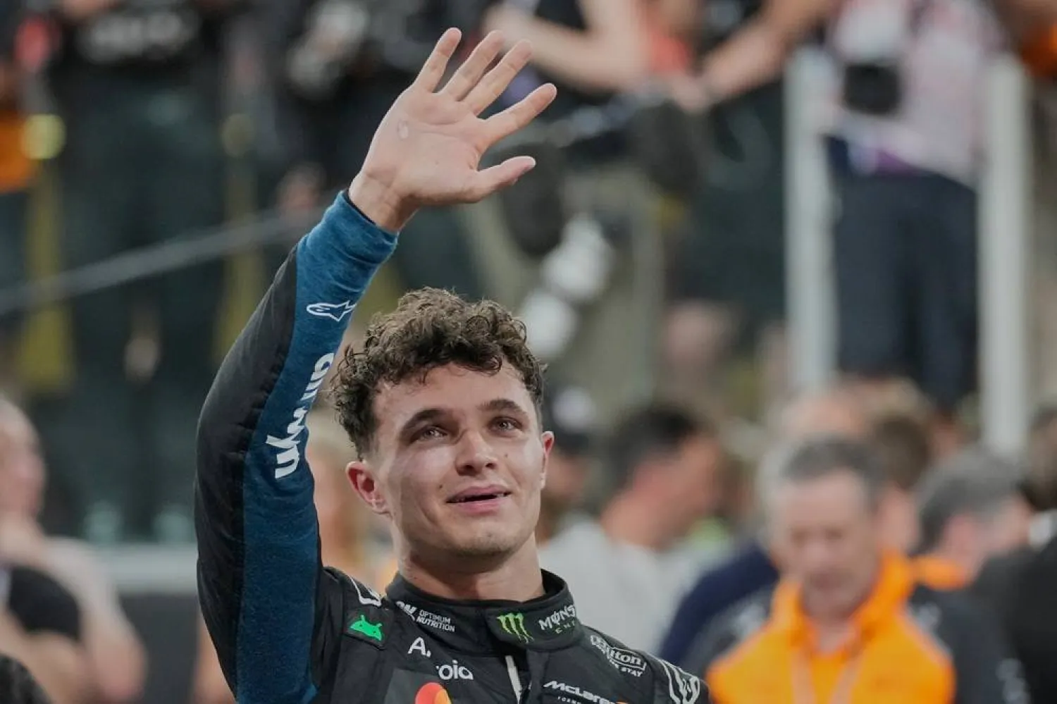  McLaren driver Lando Norris of Britain reacts after becoming a world champion after the Abu Dhabi Formula One Grand Prix in Abu Dhabi, United Arab Emirates, Sunday, Dec. 7, 2025. (AP)