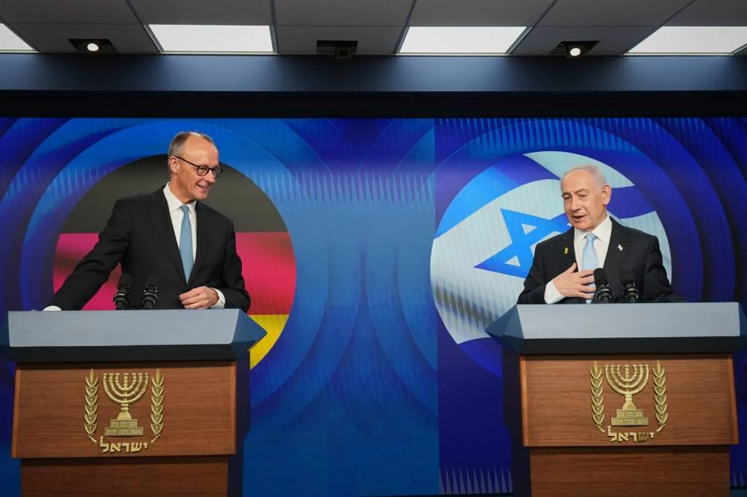 Israeli Prime Minister Benjamin Netanyahu (R) and German Chancellor Friedrich Merz address a joint press conference in Jerusalem, 07 December 2025. (EPA)