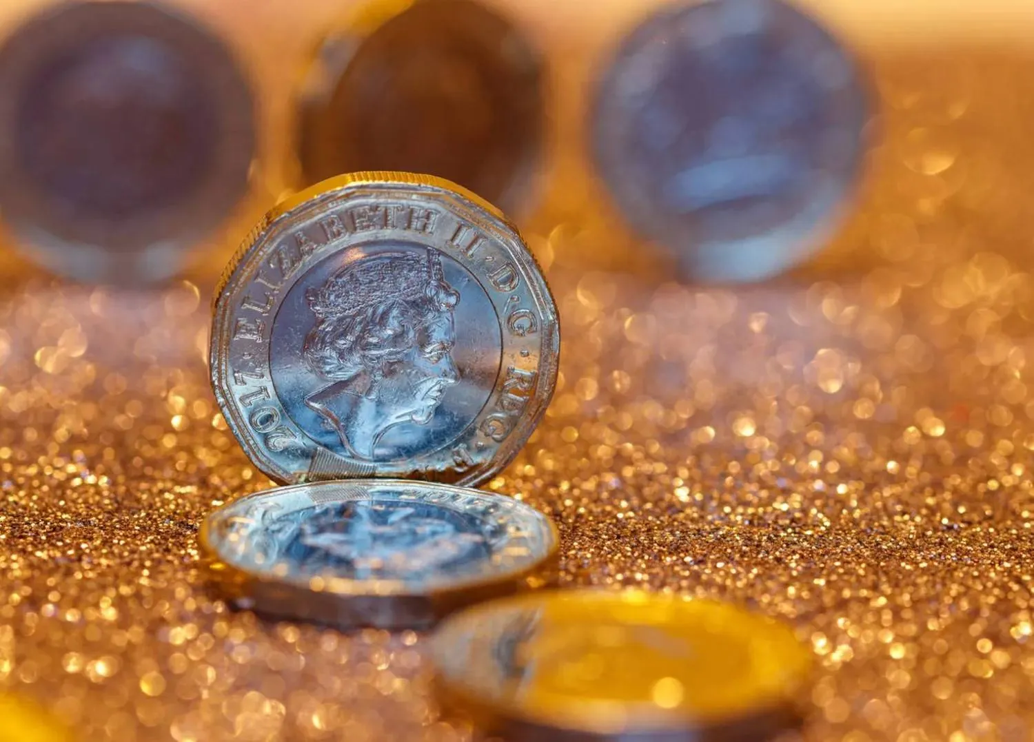 Queen Elizabeth II gold coins (Shutterstock) 