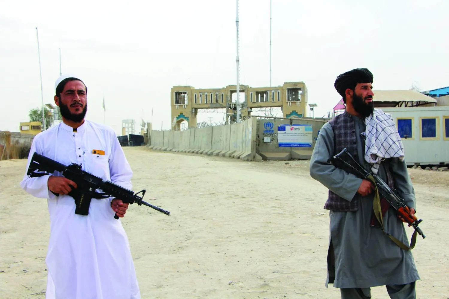 Taliban security officials stand guard at the Afghanistan-Pakistan border after border clashes, in Spin Boldak, Afghanistan, 06 December 2025. EPA/QUDRATULLAH RAZWAN
