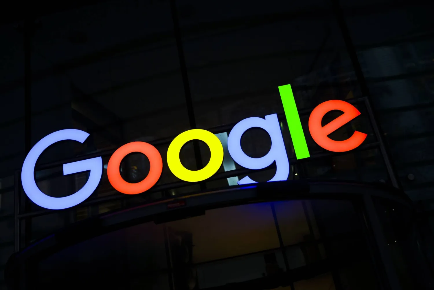 01 December 2025, Hamburg: The Google logo shines above the entrance to Google's German headquarters. (dpa)