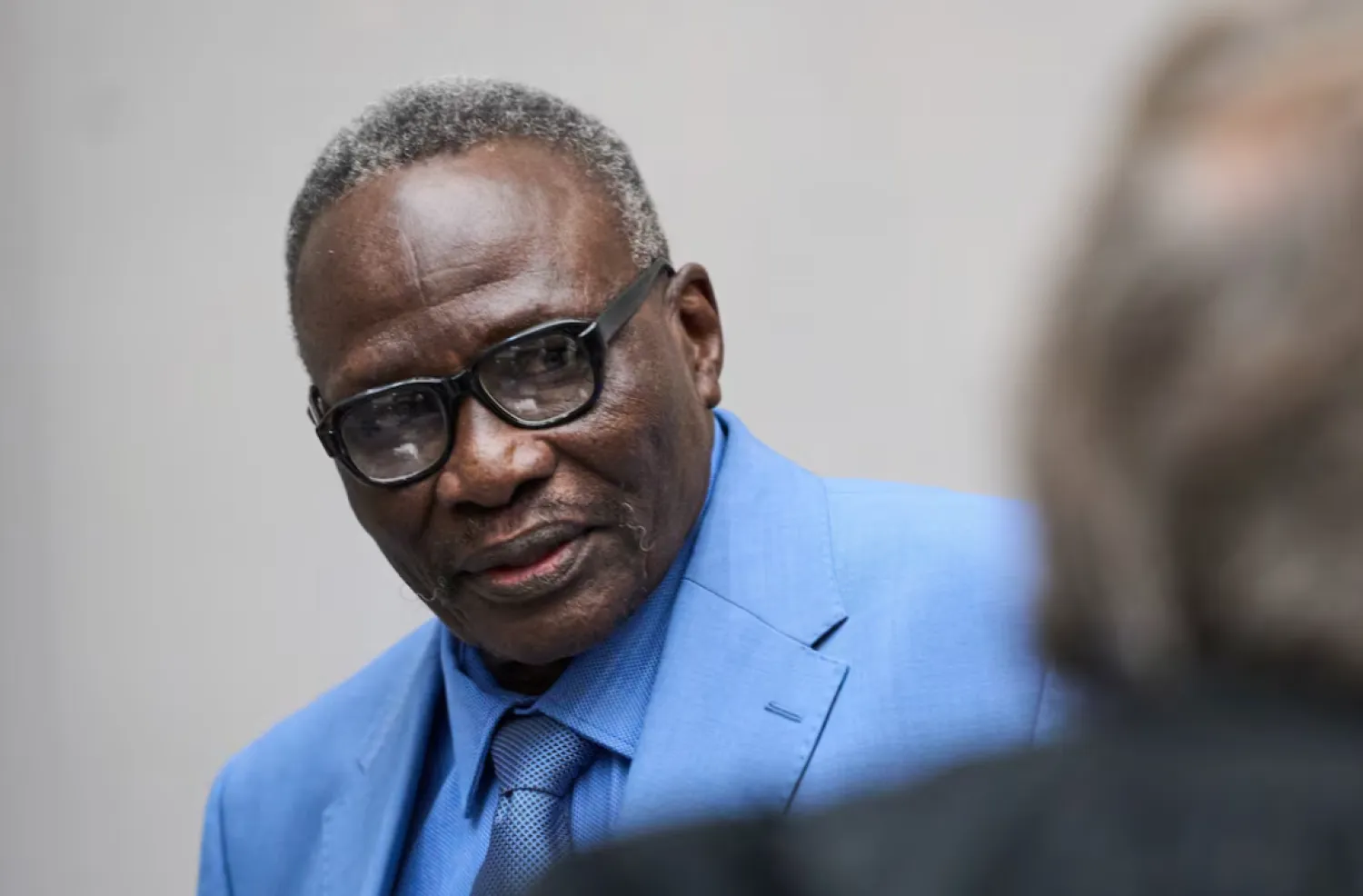  Ali Muhammad Ali Abd al-Rahman, a Sudanese national, waits to hear the verdict of the International Criminal Court, ICC, in The Hague, Netherlands, Dec. 9, 2025. Peter Dejong/Pool via REUTERS