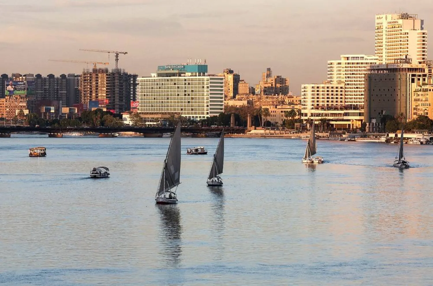 Boats sail on the Nile River in Cairo, Egypt, December 9, 2025. (Reuters)