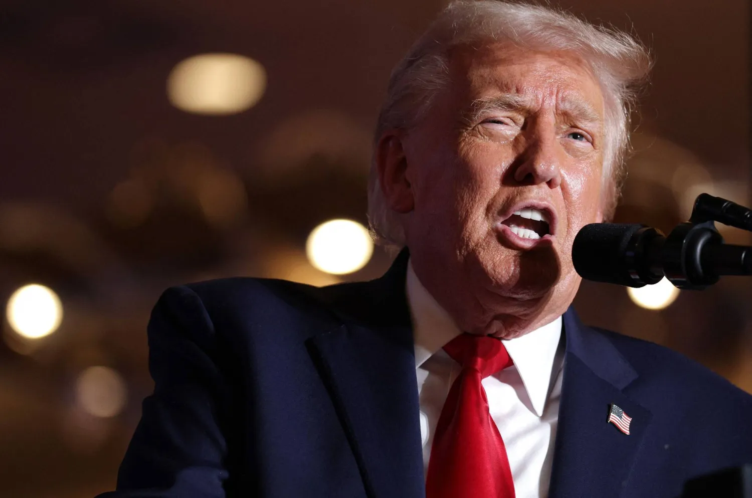 الرئيس الأميركي دونالد ترمب خلال فعالية أقيمت في ماونت بوكونو بولاية بنسلفانيا يوم 9 ديسمبر (أ.ف.ب)