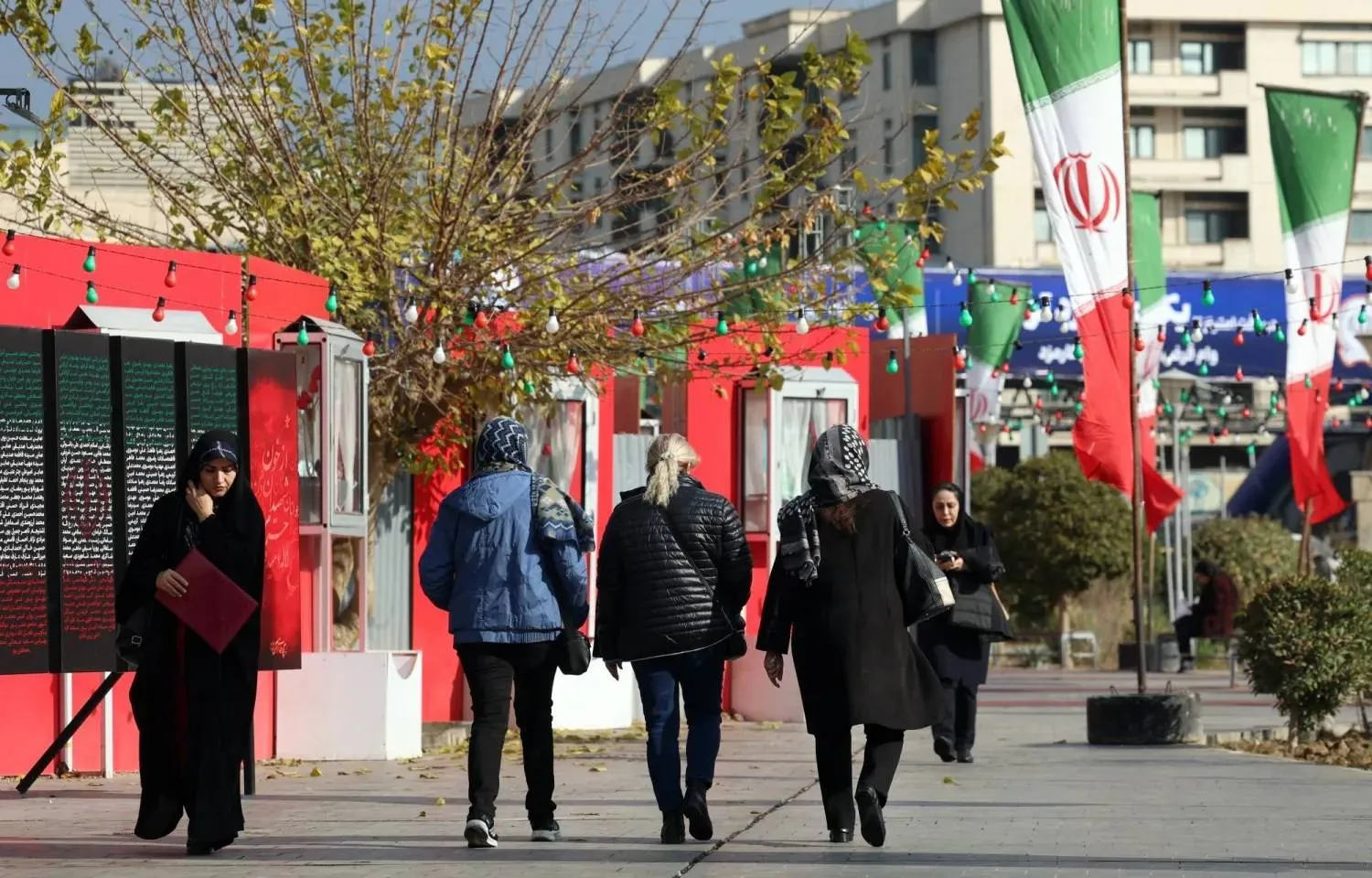 Iranian flags in central Tehran on Wednesday (EPA)