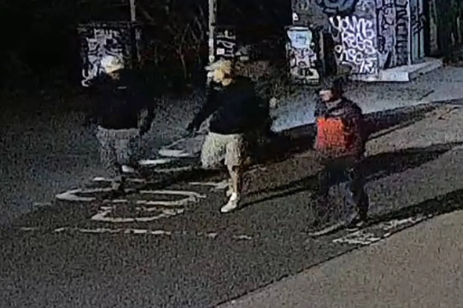 This handout image of CCTV footage released by Avon and Somerset Police on December 11, 2025 shows men in the early hours of September 25 in the city of Bristol, south-west England outside a building which housed items from the Bristol Museum's British Empire and Commonwealth collection. (Photo by Handout / Avon and Somerset Police / AFP)