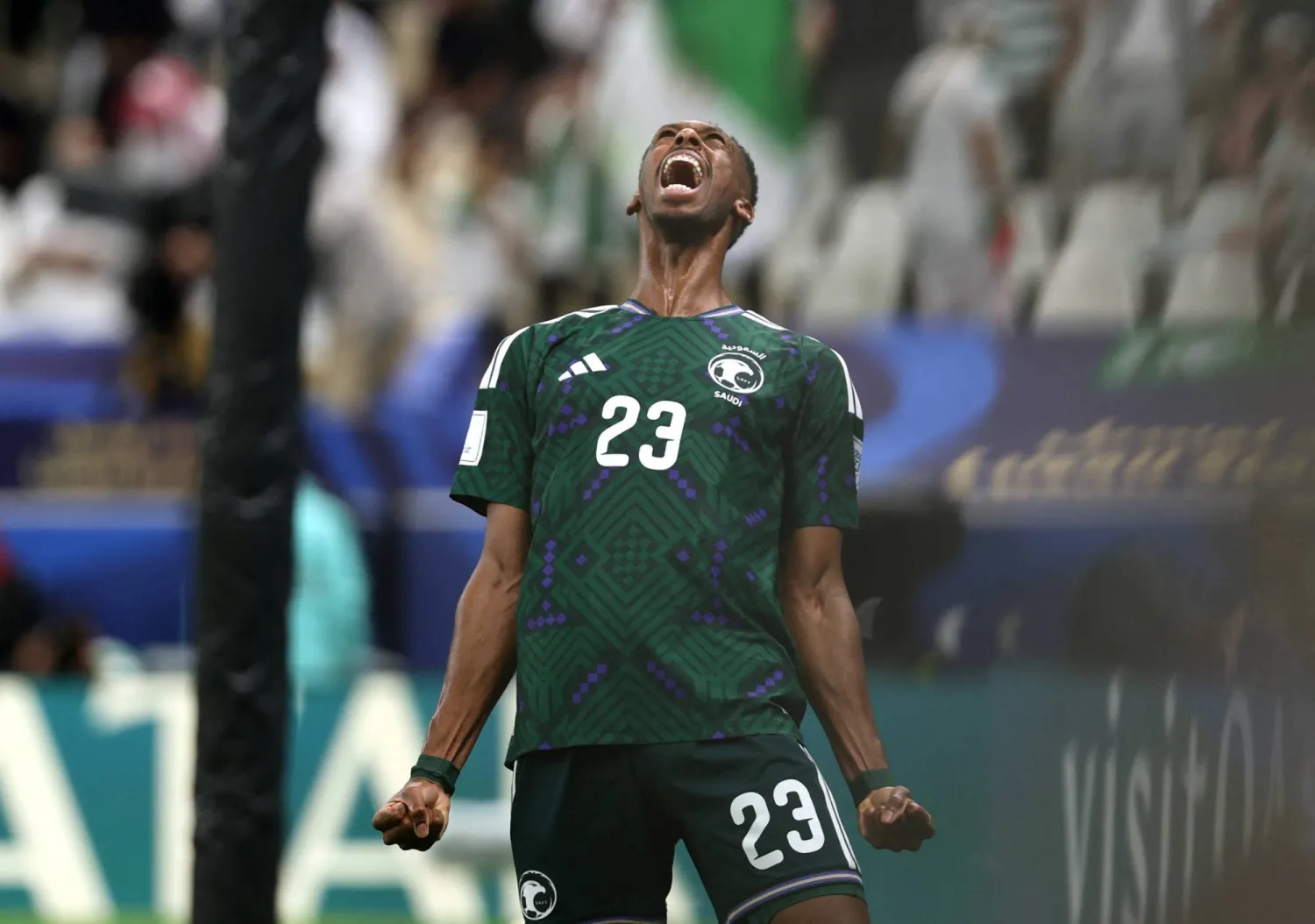 محمد كنو محتفلاً بهدفه في شباك فلسطين (رويترز)