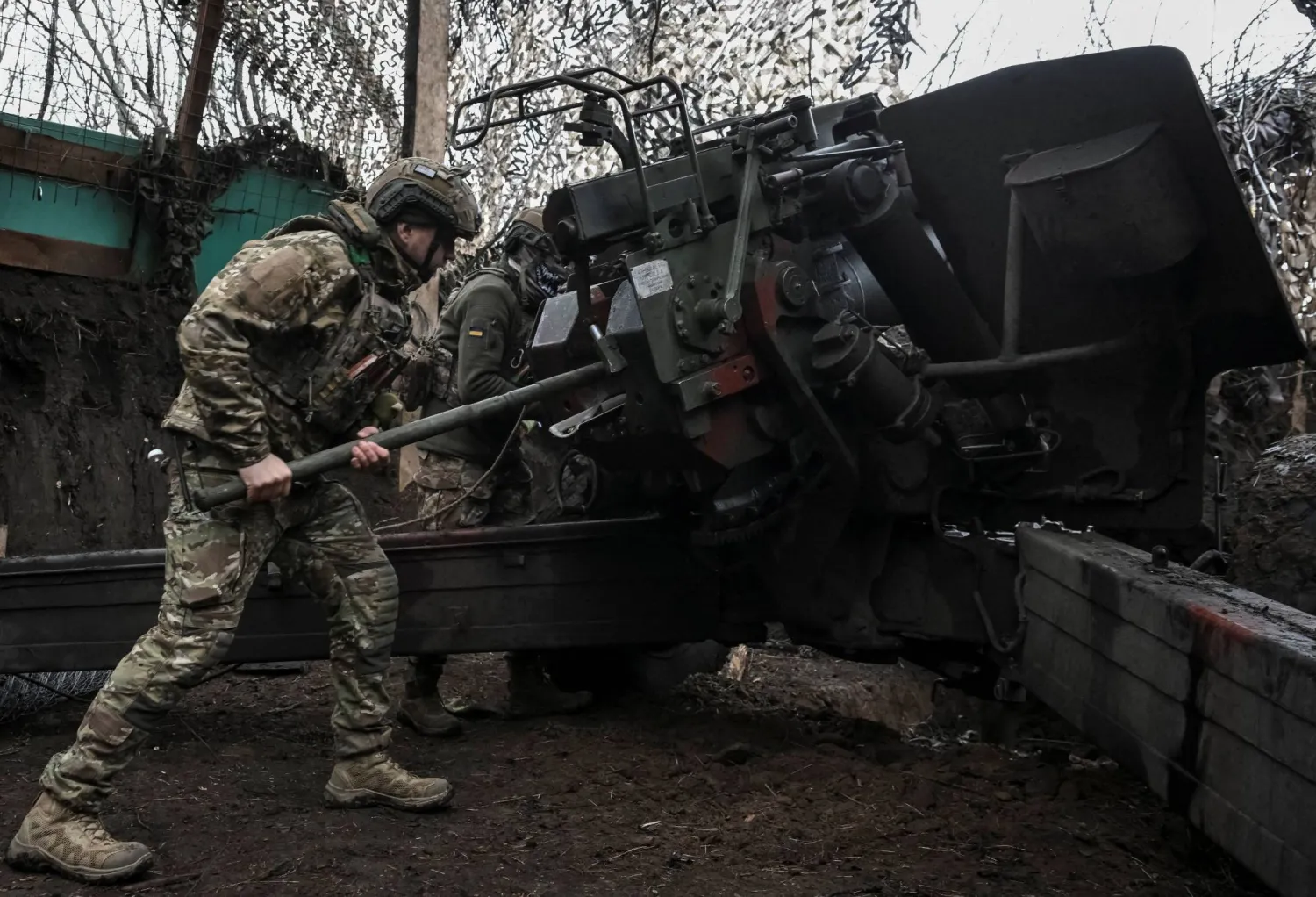  Artillerymen of the 152nd Separate Jaeger Brigade fire a howitzer towards Russian troops, amid Russia's attack on Ukraine, near the frontline town of Pokrovsk in Donetsk region, Ukraine December 11, 2025. (Reuters)