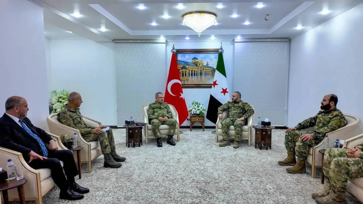 Turkish Land Forces Commander Metin Tokel and Syrian Defense Minister Murhaf Abu Qasra meet in Damascus on December 11. (Turkish Defense Ministry) 