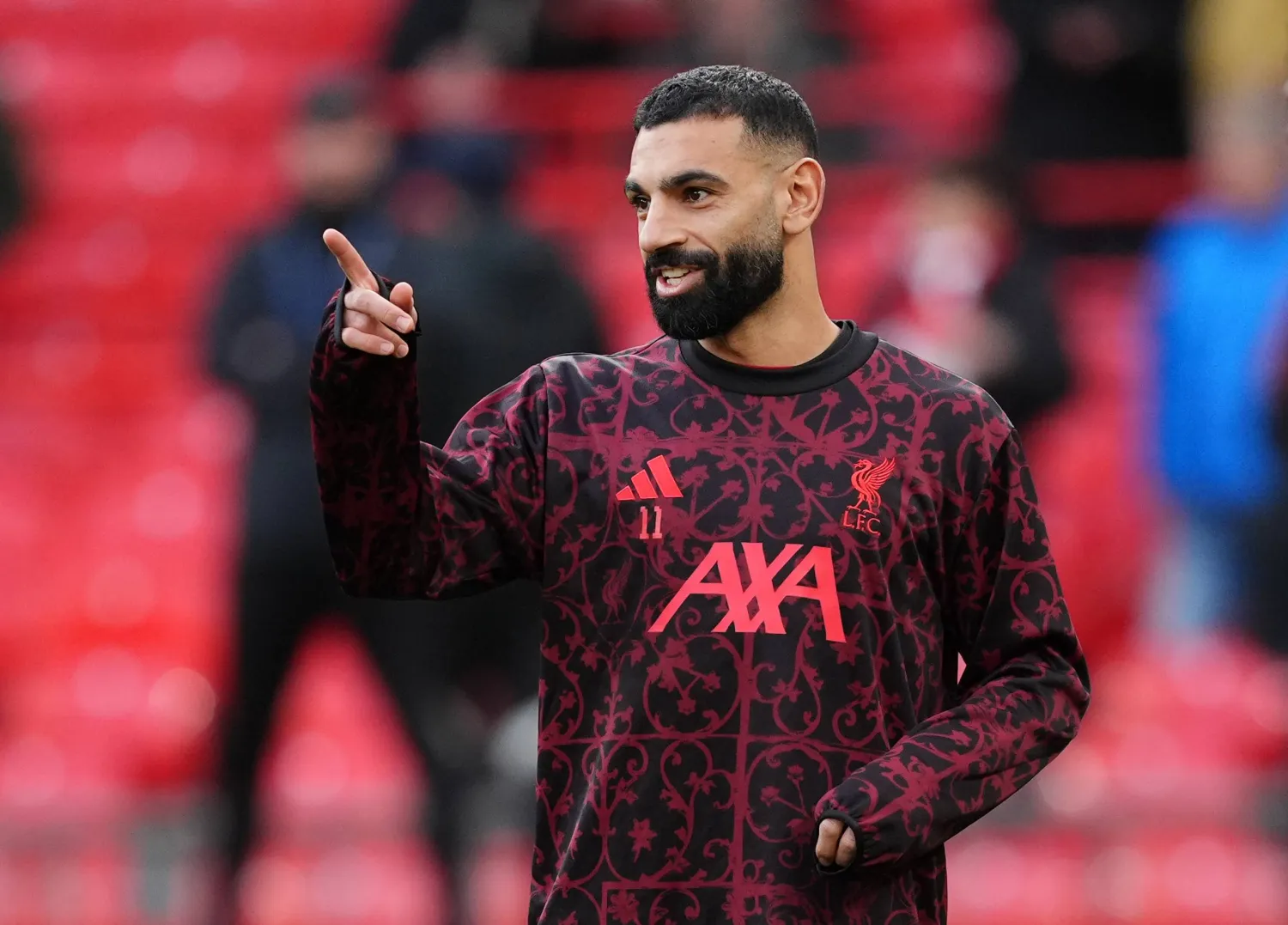 النجم المصري محمد صلاح عاد للمشاركة مع ليفربول (د.ب.أ)