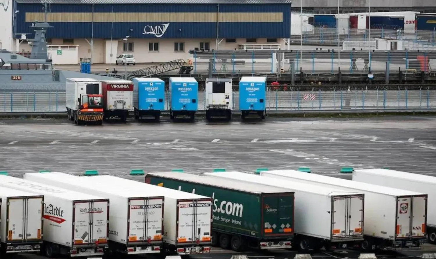 Amazon trailer trucks are seen at Cherbourg Harbor, France January 21, 2021. REUTERS/Gonzalo Fuentes