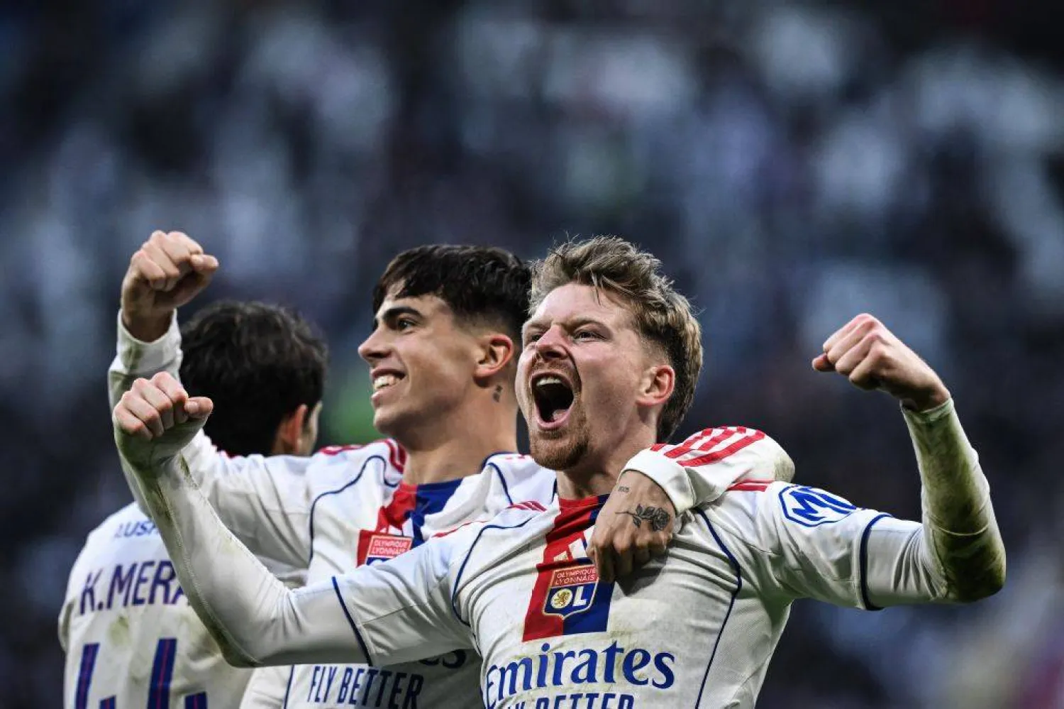 فرحة لاعبي ليون بهدف الفوز على لوهافر (أ.ف.ب) 