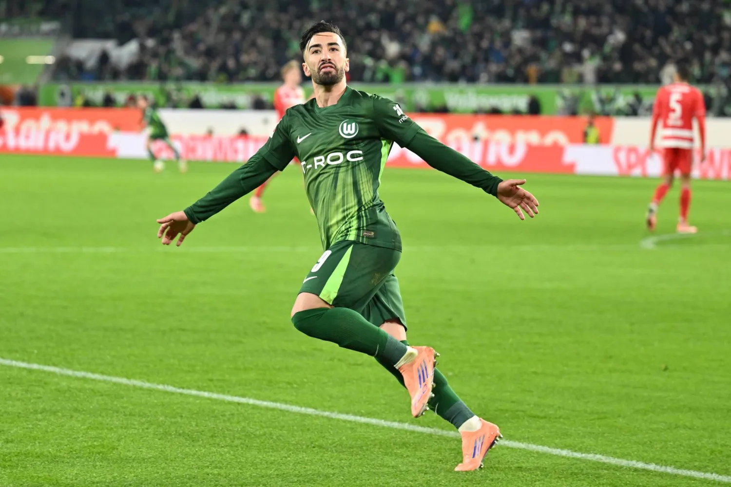 06 December 2025, Lower Saxony, Wolfsburg: Wolfsburg's Mohamed Amoura celebrates a goal that was later ruled out during the German Bundesliga soccer match between VfL Wolfsburg and 1. FC Union Berlin at the Volkswagen Arena. (dpa)