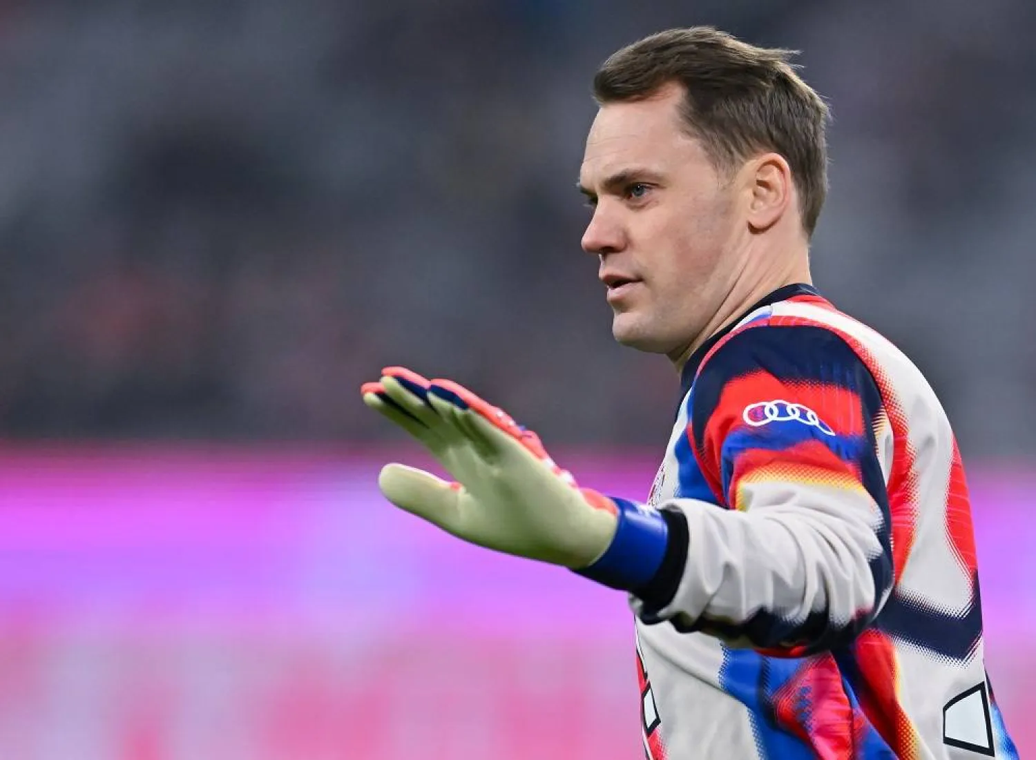 14 December 2025, Bavaria, Munich: Bayern Munich goalkeeper Manuel Neuer warms up ahead of the German Bundesliga soccer match between Bayern Munich and FSV Mainz 05 at the Allianz Arena. (dpa)