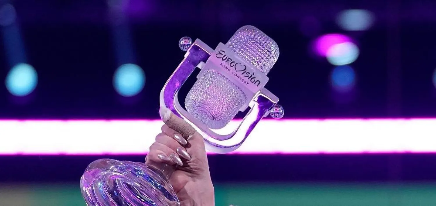 Nemo of Switzerland celebrates holding the trophy after winning the Grand Final of the Eurovision Song Contest in Malmo, Sweden, Sunday, May 12, 2024. (AP)