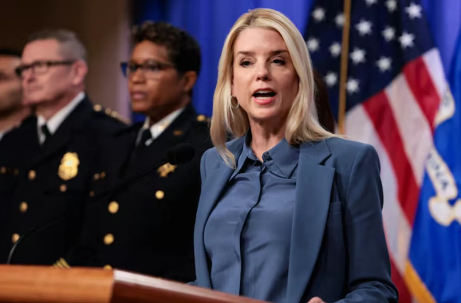 US Attorney General Pam Bondi speaks at a press conference following the arrest in the D.C. pipe bomber investigation, at the Justice Department in Washington, D.C., US, December 4, 2025. REUTERS/Jessica Koscielniak 