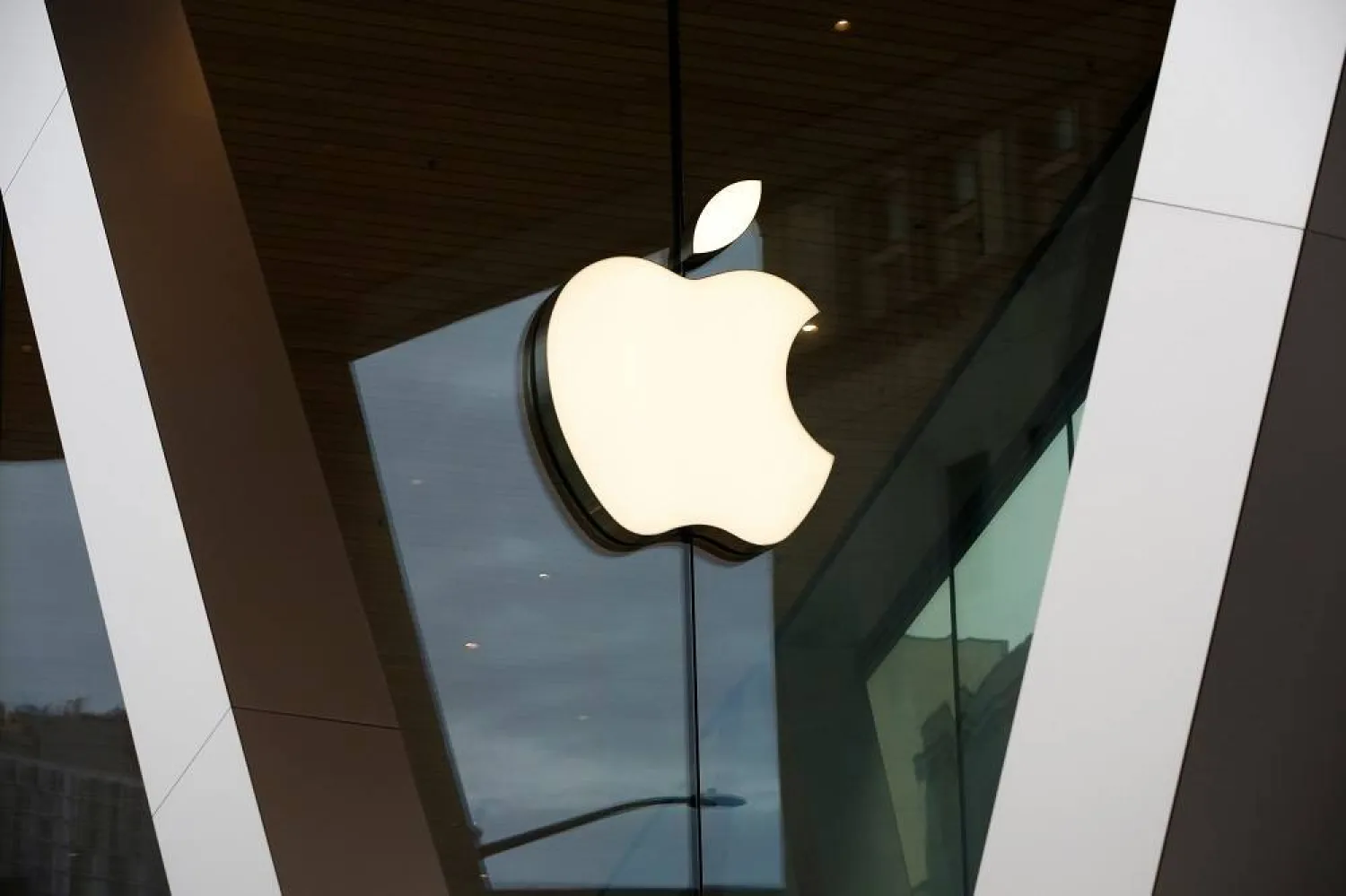 An Apple logo adorns the façade of the downtown Brooklyn Apple store on March 14, 2020, in New York. (AP)