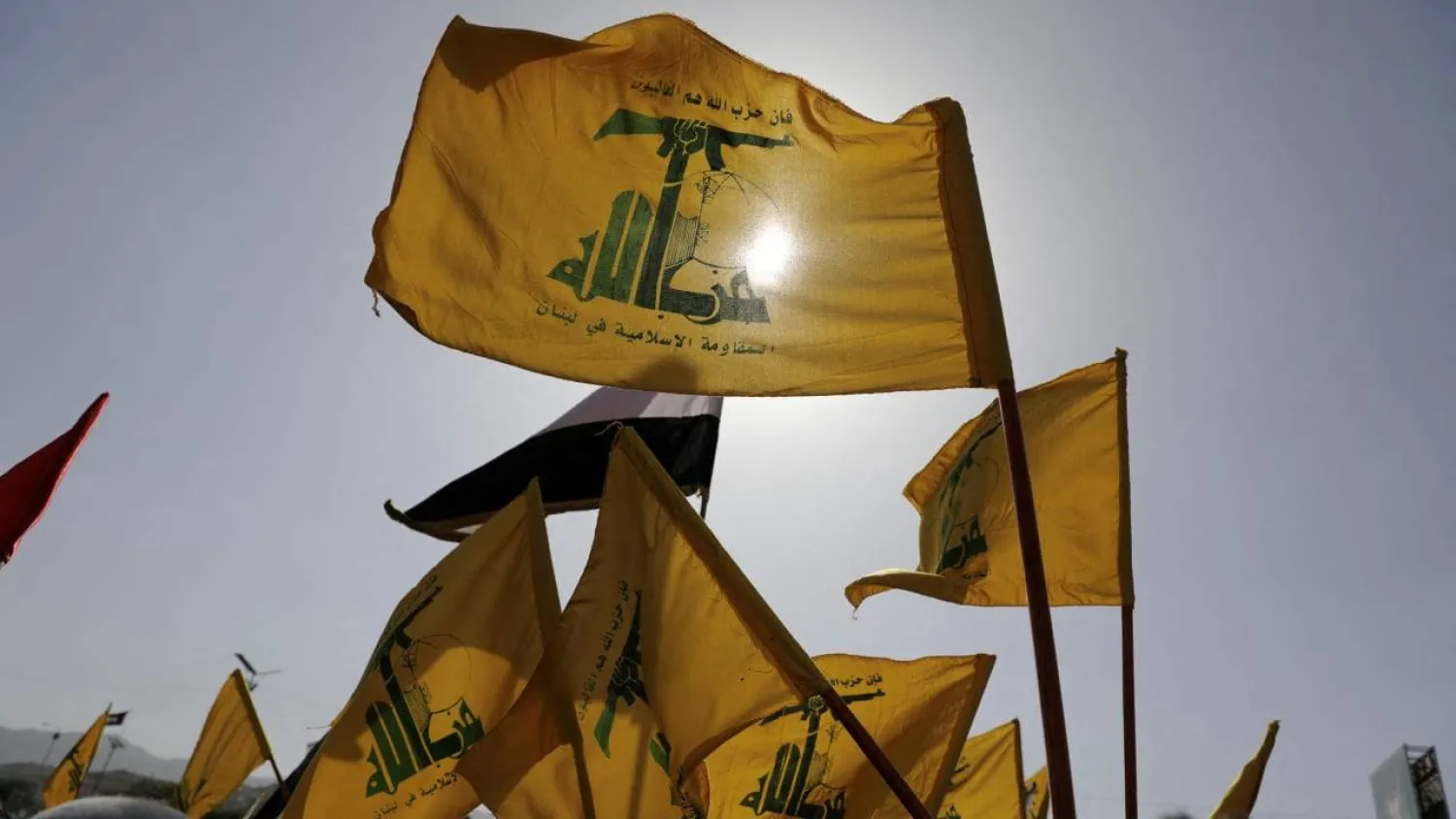 Hezbollah flags flutter as protesters, mainly Houthi supporters, rally to show support to Palestinians in the Gaza Strip and Lebanon's Hezbollah, in Sanaa, Yemen September 27, 2024. (Reuters) 