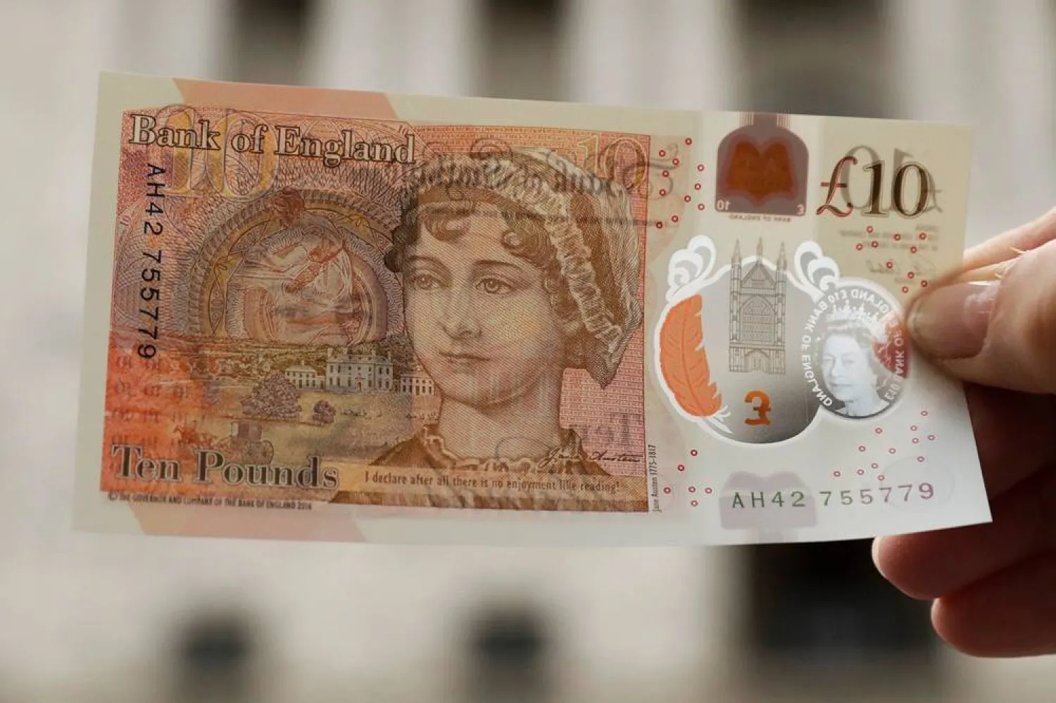 One of the new British 10 pound notes is posed for photographs outside the Bank of England in the City of London, Thursday, Sept. 14, 2017. (AP)