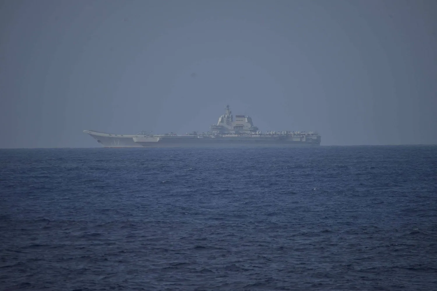 Chinese aircraft carrier Shandong sails in Pacific Ocean waters, about 300 kilometers (186 miles) south of Okinawa prefecture, Japan, April 5, 2023. (Reuters)