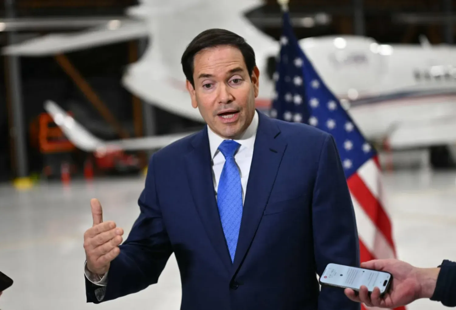 US Secretary of State Marco Rubio speaks to traveling journalists at the John C. Munro Hamilton International Airport in Hamilton, Ontario, on November 12, 2025 after the G7 foreign ministers meeting. (Photo by Mandel NGAN / POOL / AFP)
