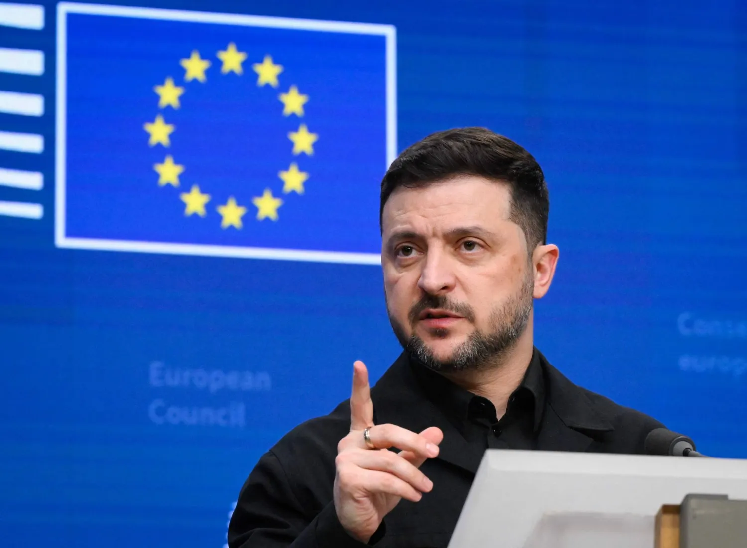 Ukraine's President Volodymyr Zelensky speaks during a press conference as part of the European Council meeting in Brussels on December 18, 2025. European Unions leaders meet in Brussels on December 18 and 19, 2025, to discuss in particular the need to support Ukraine, transatlantic relations and the EU's strategic autonomy. (Photo by JOHN THYS / AFP)