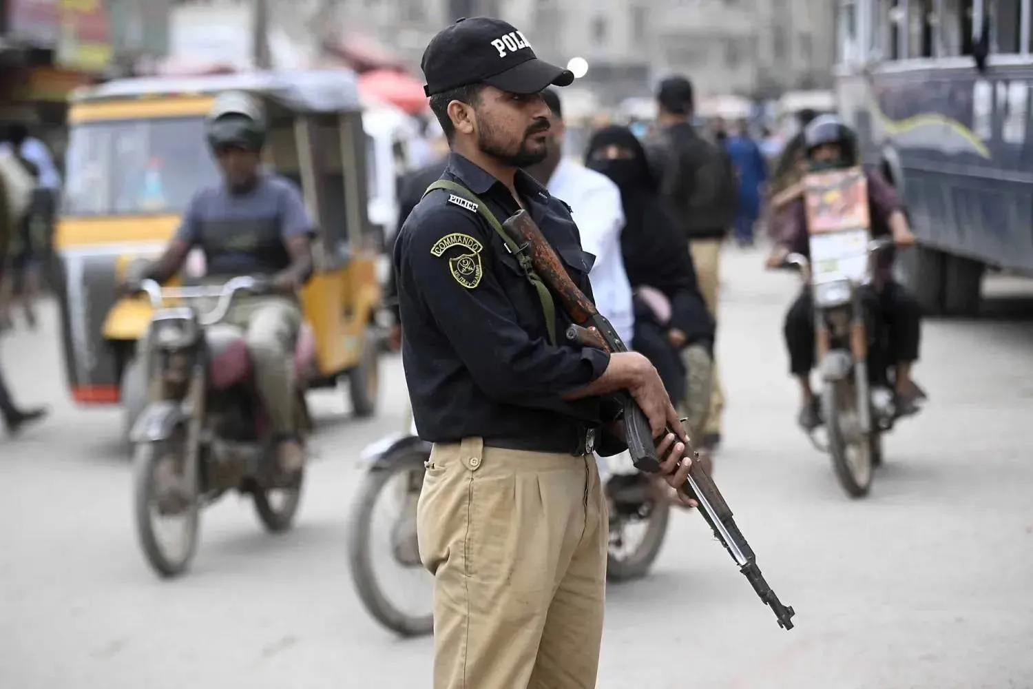 File photo: Police officers stand guard to secure a procession during the mourning month of Muharram in Karachi, Pakistan, 03 July 2025. EPA/SHAHZAIB AKBER
