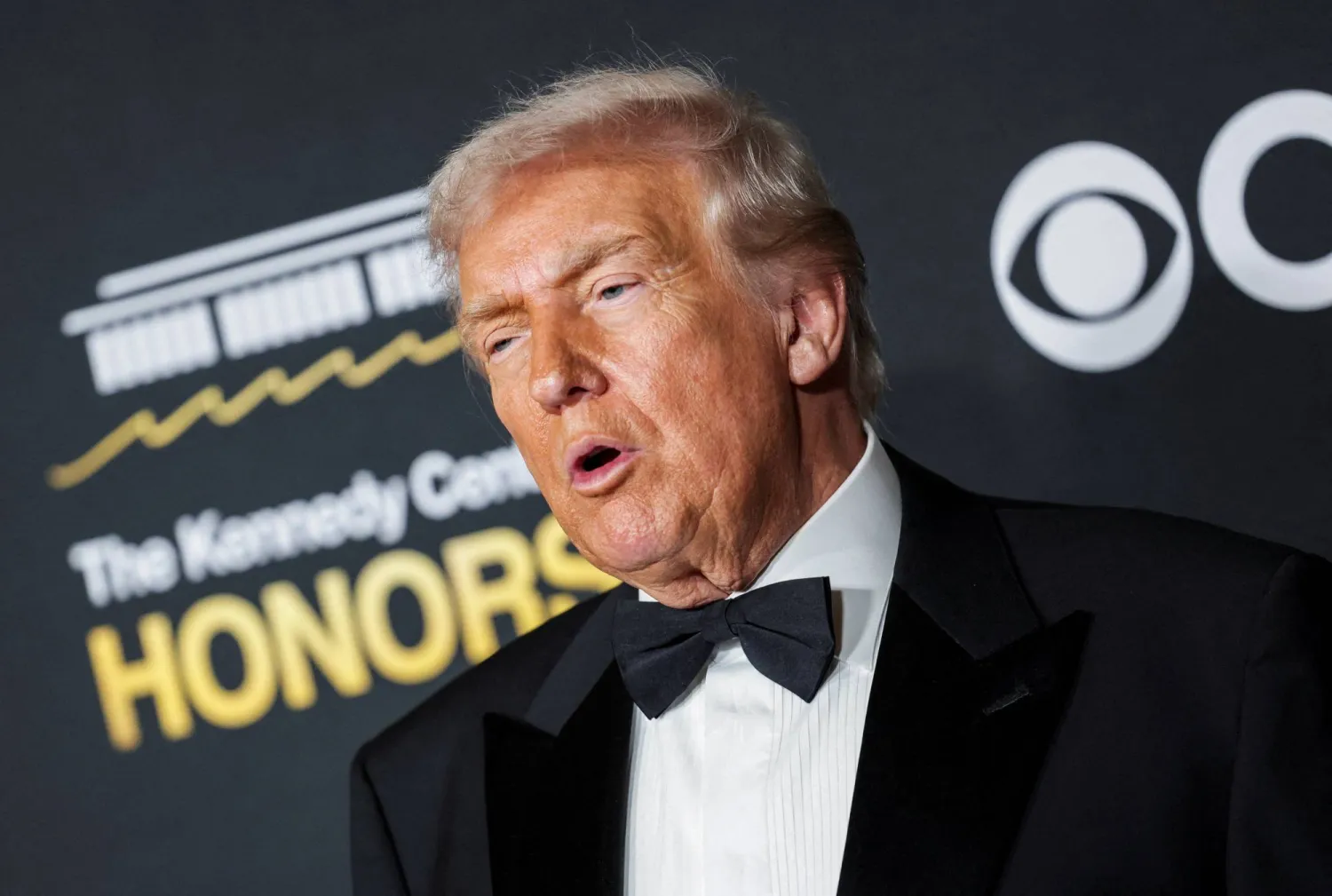 FILE PHOTO: US President Donald Trump poses on the red carpet for the 2025 Kennedy Center Honors at the John F. Kennedy Center for the Performing Arts in Washington, D.C., US, December 7, 2025. REUTERS/Jeenah Moon/File Photo