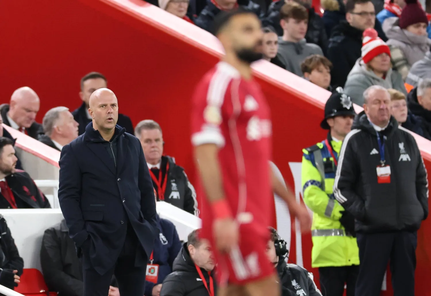 Liverpool manager Arne Slot (L) looks on towards Mohamed Salah of Liverpool (R) during the English Premier League match between Liverpool FC and Brighton & Hove Albion, in Liverpool, Britain, 13 December 2025. EPA/ADAM VAUGHAN 