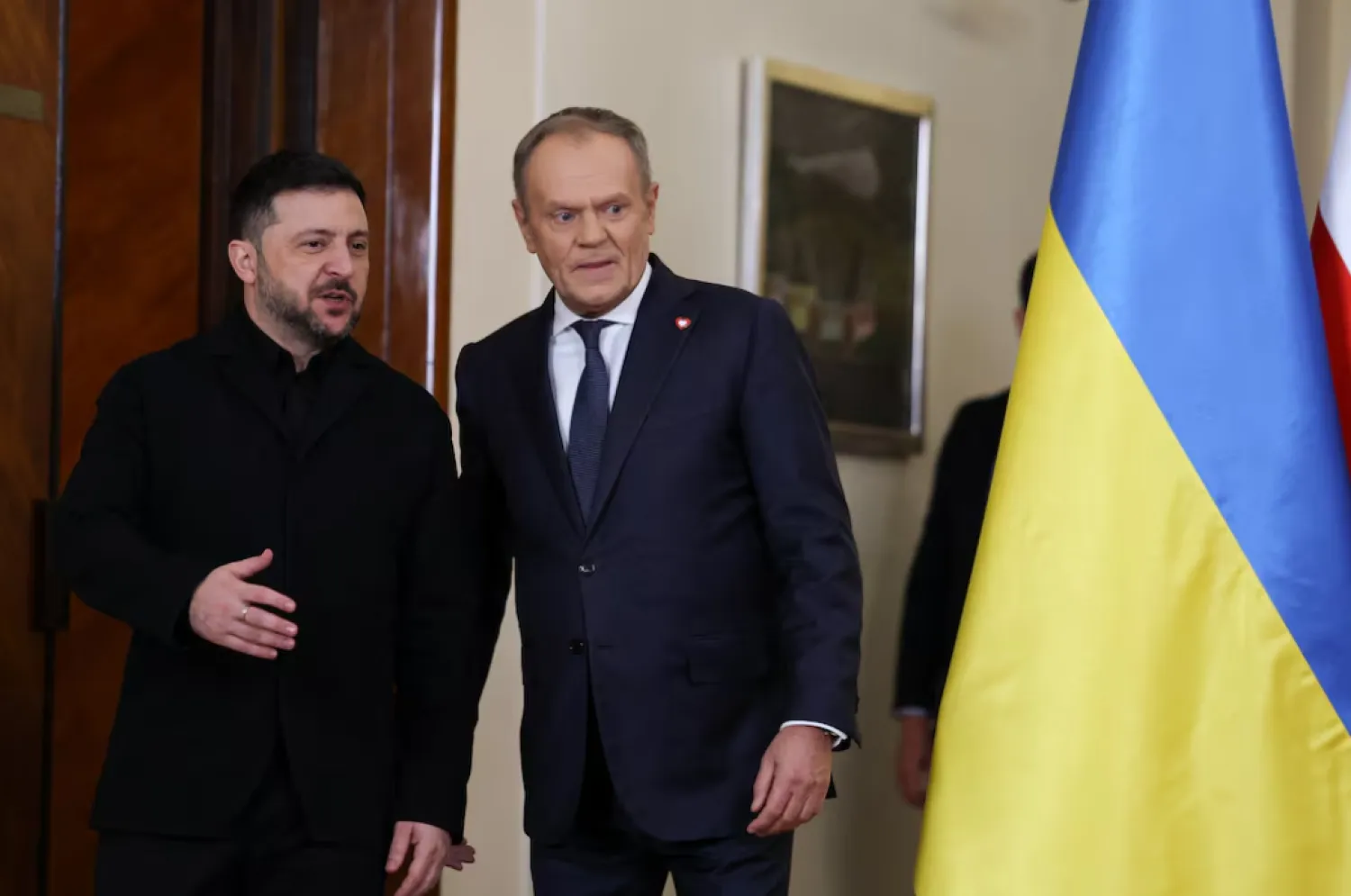 Ukrainian President Volodymyr Zelenskiy meets Polish Prime Minister Donald Tusk at the Chancellery of the Prime Minister in Warsaw, Poland, December 19, 2025. REUTERS/Kacper Pempel 