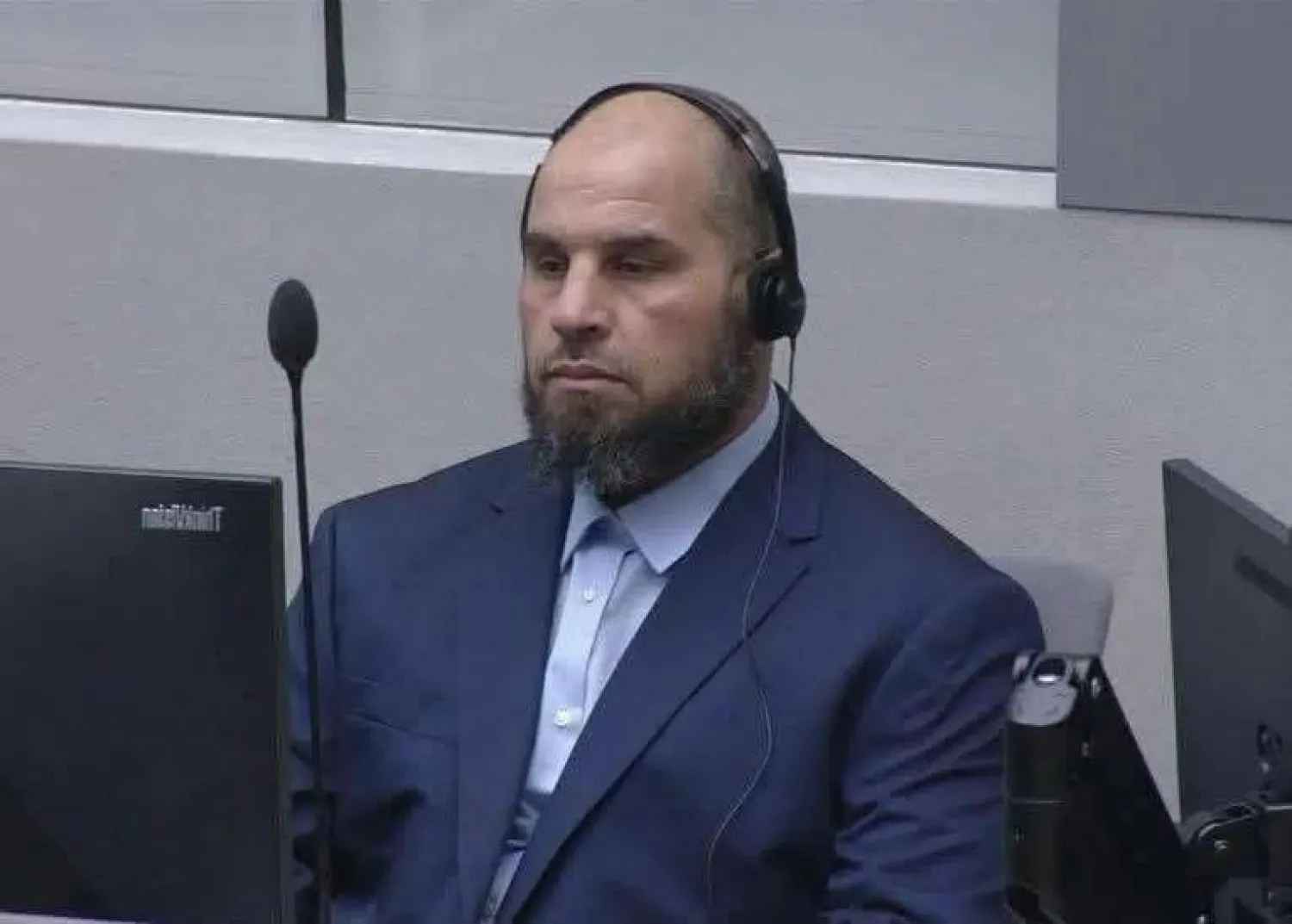 الهيشري القيادي في «جهاز الردع» الليبي خلال مثوله أمام المحكمة الجنائية الدولية الأربعاء (المحكمة)